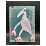 Authentic and original Mose T Folk Art White/Pinkish Tiki Birdwith signature soda can tab hanger…..8-1/2 x 11-3/4