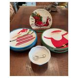 Seven Christmas plates, the snowman and Santa do show signs of crazing and a small chocolate bowl