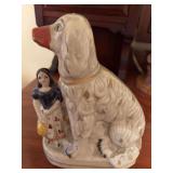Antique Staffordshire porcelain dog with girl figure 6” x 7 1/2”