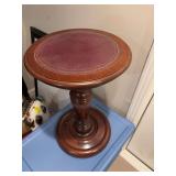 Plant stand 12” x 20”. Has a 10” leather piece on top