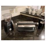 A Starbucks and Mr. coffee coffee grinder, and a Breville Panini/Toast press