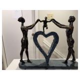Metal and resin family love sculpture
