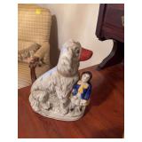 Antique Staffordshire porcelain dog with girl figure 6” x 7 1/2”