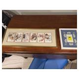 Two frames one with wedding and one needlepoint rabbit. 25“ x 10“ and 8 1/2“ x 10“