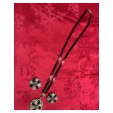 Gorgeous black beaded locket with clip on earrings