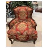 Vintage French Louis XV carved wood chair with red and gold demask upholstery. 28“ x 30“ x 33“. The feathered seat cushion is 19 inches from floor.