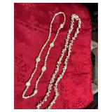 Two shell necklaces. 17 inches and 14 inches.