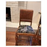 Table and chair set. Spanish Antique tooled leather dining chair..Set of 6 -18“ x 18“ x 36“. The seat is 18 inches from ground. The table measures 38 x 60“ x 31“. Has 2 additional ￼pull ou