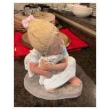 Austin girl and lamb sculpture 10“ x 10 1/2“