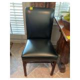 Black leather chair by Statesville Chair Company, 18“ x 22“ x 37“. The seat is 19 inches from floor