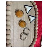 Two clip on pair of earrings and one pierced