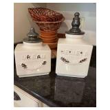 Two piece canister set, Believe and Dream, 14 inches and 10 1/2 inches tall both are 7 1/2 inches wide