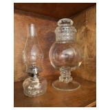 Vintage oil lamp and lidded  jar. The jar is 8“ x 14“. The lamp is 5“ x 12“.