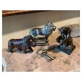 7 x 5 1/2“ cast-iron lion, 6 x 4“ wooden lion, a set of brass keys and a thinking man statue that is 6 x 3 1/2