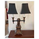 Black and Gold Lionhead double candelabra style table lamp. 14“ x 24“ with the base being 7 in.