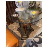 Unique table with three giraffes and 30 inch round glass top.