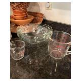 Set of three nice glass mixing bowls and two glass measuring cups