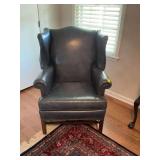 Ethan Allen blue leather Chippendale wing back chair. 34“ by by 33“ x 43 1/2“ seat is 19 inches from floor.