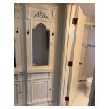 White wooden mirror with hooks and shelf matches lot number 143.  19 3/4“ x 76“. Shelf is 4” in diameter
