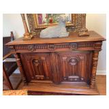 French buffet measuring 55“ x 22 1/2“ x 38 1/2“ the bottom does have a cut out where they had inserted a TV as shown in photos. It does have a shelf laying across the bottom, currently not being