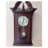 Howard Miller wall clock with beveled glass in working condition 16“ x 29 1/2“ x 7“