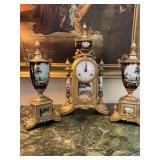 Italian Frans Hermle Lancini Garniture 3 piece brass and porcelain Mantle Clock set… clock is 9” x 16”, side pieces are 6“ x 13”. The small hand on clock has been broken..No key