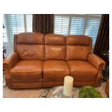Tan Leather Couch from Stash.. reclines on both ends-with head and foot reclining options -80“ x 38“ x 42“ the seat is 21 inches from floor..