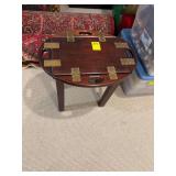 Small butler style table with brass from Honduras. 17” x 13” x 16”