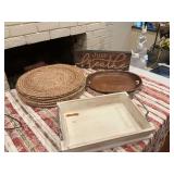 Eight placemats with a 16 x 5“ breathe sign and two wooden handled trays