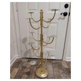 Gold toned 12-arm hat/wig rack…..36” tall