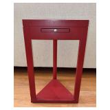 Red wooden art deco triangular table with 2 pull out trays…..15 x 13 x 25” tall