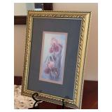 Signed Glynda Turley watercolor print depicting deep purple and pink iris florals….framed in a gold gilt…..9-3/4 x 13-1/2