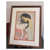 Japanese woodblock print reproduction featuring a portrait of a woman by Kitagawa Utamaro…..13-1/4 x 17-1/4