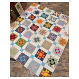 Vintage Ohio Star hand sewn quilt…..in good condition…..approx. 75-1/2 x 88-1/2…..the edges do have dark spots from normal use and spitting on back