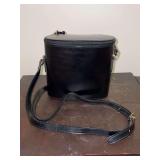 Cristian black leather oval crossbody bucket bag…..7 x 3-1/2 x 6-1/2 tall