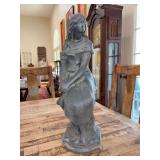 Solid concrete statue of seated girl with flowers…..does have blemishes but also adds an artistic appeal as well…..18-1/2” tall