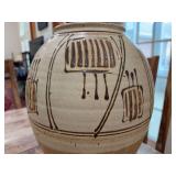 Large ceramic mantle or floor vase featuring brown and tan motif…..it is signed but unable to read maker…..14-1/2” tall