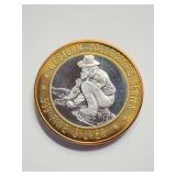 Sam's Town Western Collector's Series gaming token. The central portion of the token is crafted from .999 fine silver.
'Gold Panner' design.  Generally $10 gaming tokens used in slot machines.