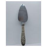 Vintage Kirk Repousse Cake Pie Server made of sterling silver with a stainless steel blade.