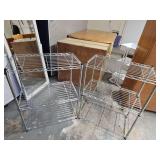 Set of two matching wire shelf units. Each unit is 22.75 x 13 x 29 in tall. Shells are adjustable.