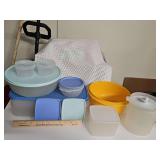 Tupperware items. Three with no lids, two extra lids with no bowls.