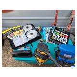 Miscellaneous and unrelated grouping. Some consumer reports magazines, a couple of dummies paperbacks, and two palm Sanders.