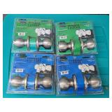 Four lock sets and brushed aluminum finish.. Two privacy lock sets, and two passage lock sets.