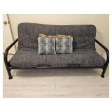 Full size futon with tweed cover and four pillows. Frame is tubular metal. 77x37 x34 in tall. Seat height 16.5 in.