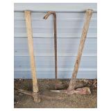 Two pickaxes and a crowbar.