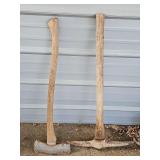 Double-bladed x and a pickaxe.