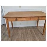 Solid wood table/desk with 2 drawers. (Left drawer sticks) 54 x 30 x 30 in tall.