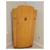 Antique wardrobe. Very nicely detailed. 36x19x62.25 in tall. Includes key. See all photos.
