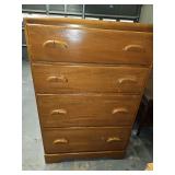 Vintage solid wood four drawer waterfall chest. Elm wood. 28.5 x 17.25x 45.5 in tall. Show sign of wear.