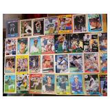 Approximately 95 sports cards dating from the late '80s to the early '90s. See all photos.